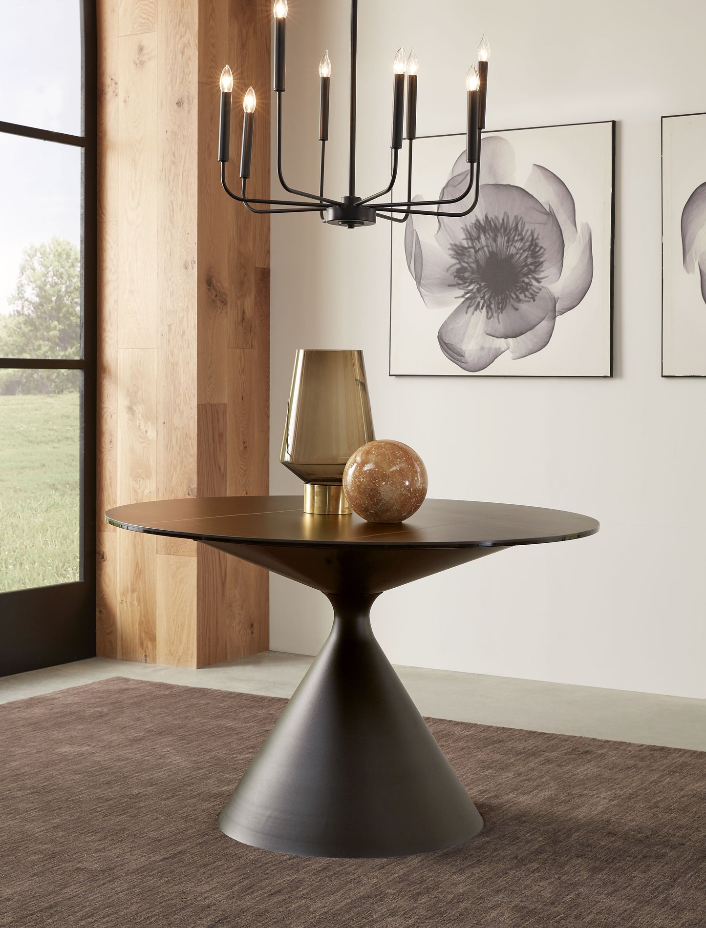 Modus Furniture International Winston stenen blad metalen onderstel ronde eettafel in zwart. -