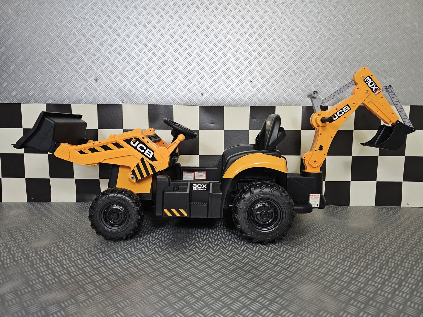 Children's tractor JCB Sitemaster 12 volts