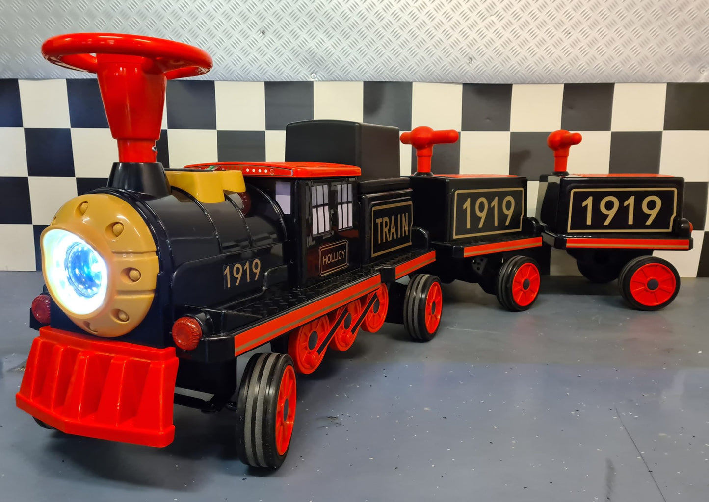 Elektrische kindertrein 12 volt met 2 wagons