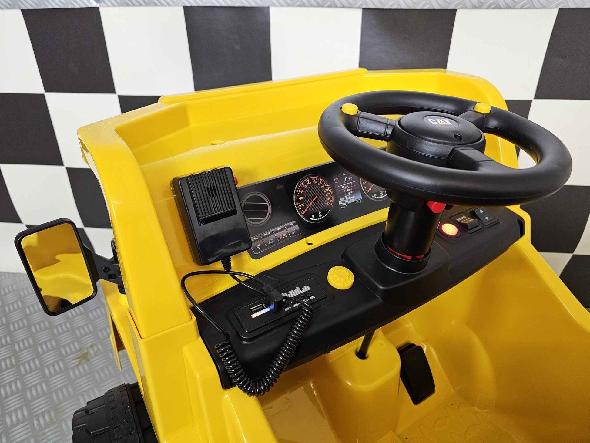 Caterpillar kinder kiepwagen 12 volt